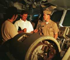 Congressman Weygand on the USS SARATOGA Bridge (photo courtesy of North East Independent Newspaper)